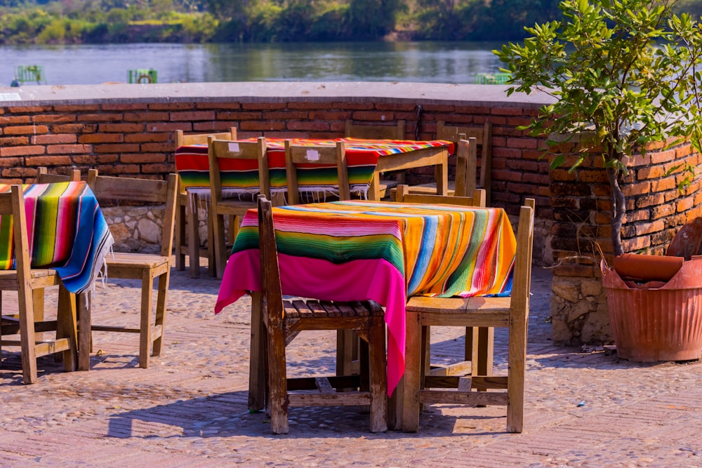 a table with a colorful table cloth on it