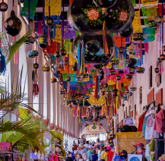 A vibrant Mexican street market in Australia with colorful decorations and smiling families.