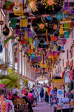 An inviting street market filled with vibrant colors and local crafts