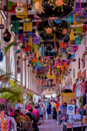 An inviting street market filled with vibrant colors and local crafts