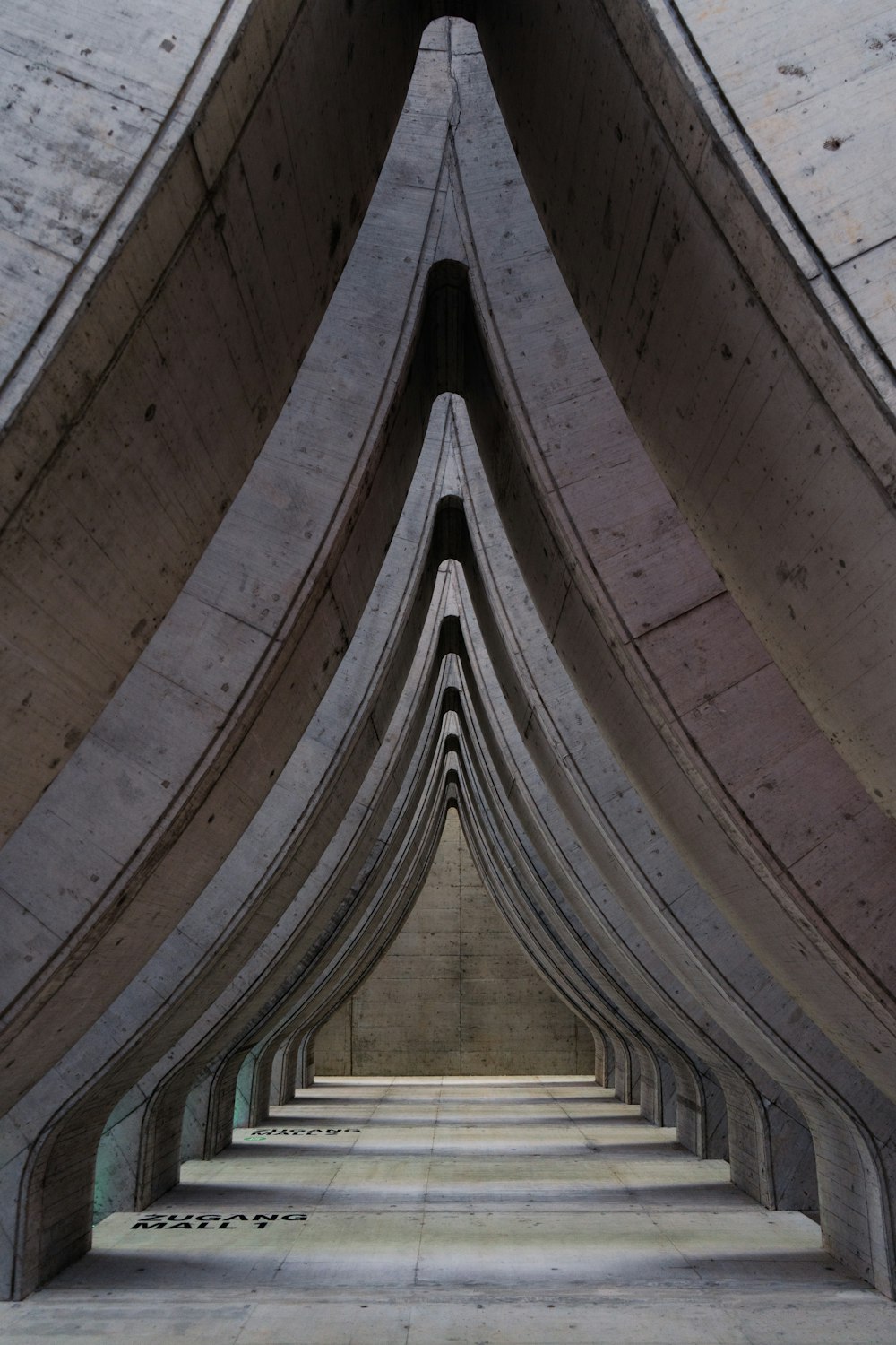 a very long row of stairs in a building