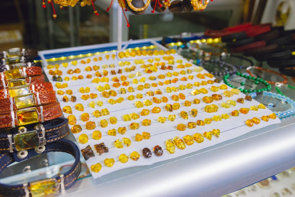 a table with a lot of beads on it