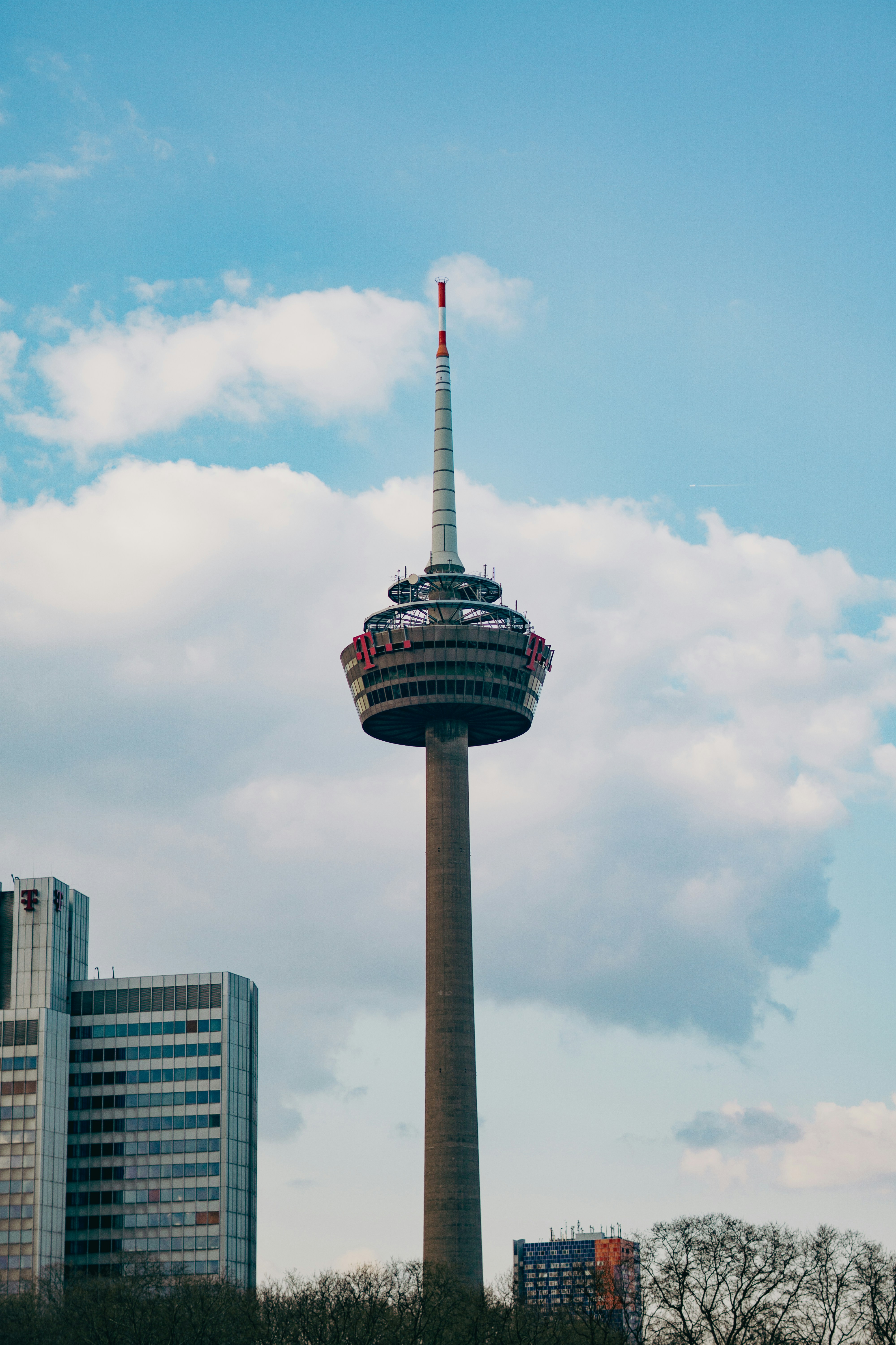 a tall tower with a sky scraper on top of it