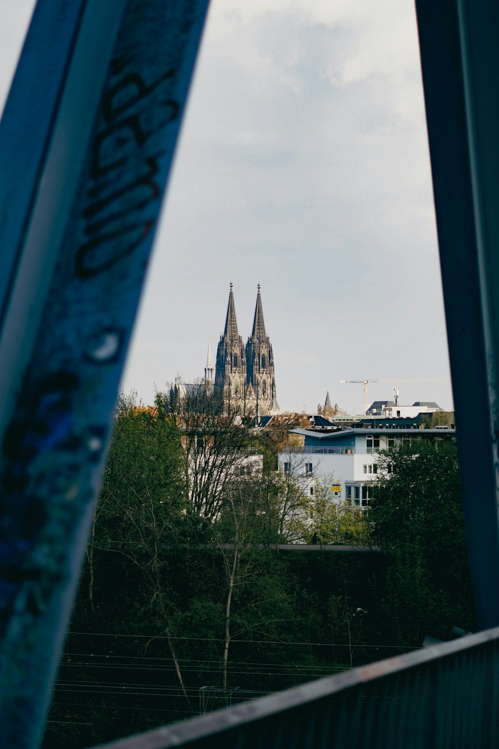 a view of a cathedral from across a bridge