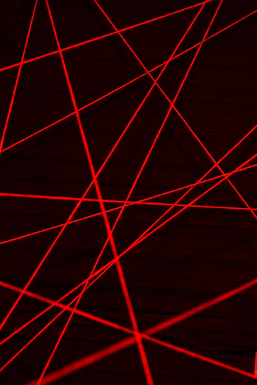 Laser device emitting a sharp beam in a dark room