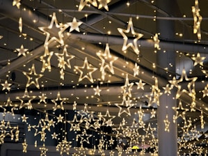 Close-up of a glowing star-shaped decoration hanging in the Space Fun party room.