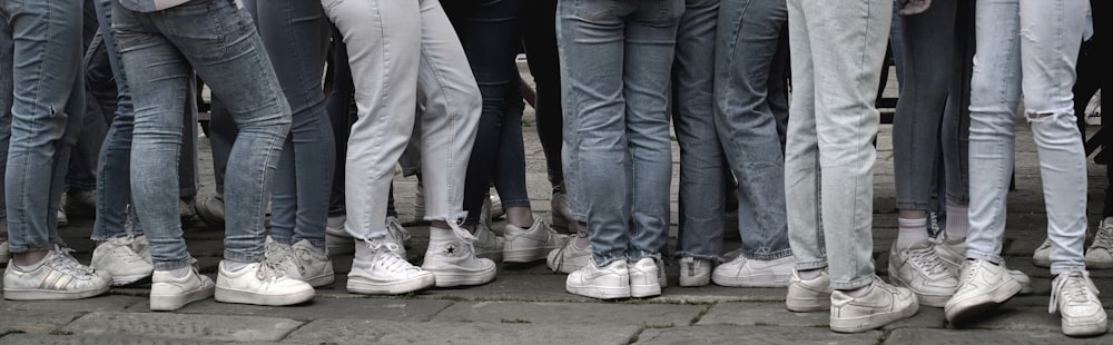 a group of people standing next to each other