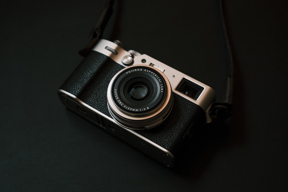 a camera sitting on top of a black table