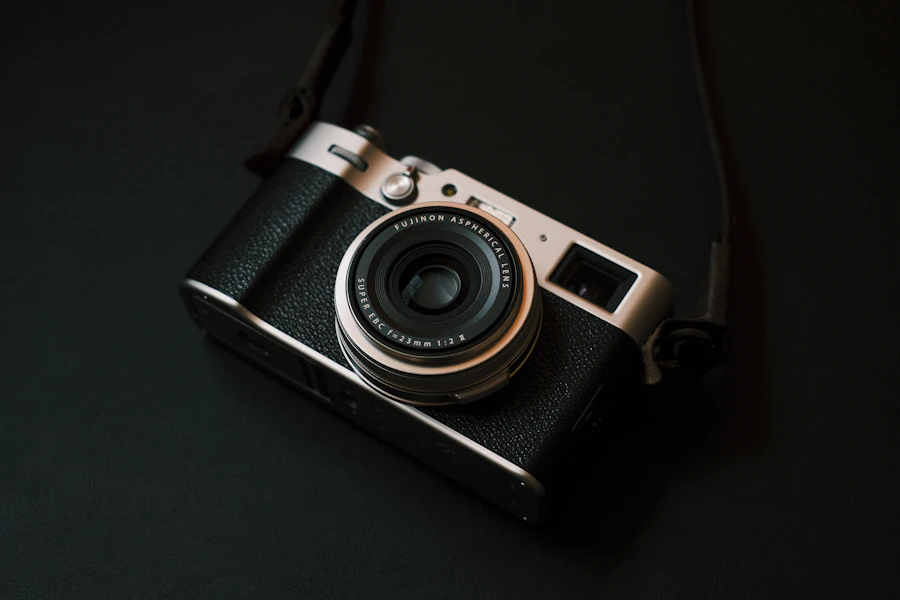 Camera resting on a dark tabletop