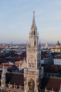 a large clock tower towering over a city
