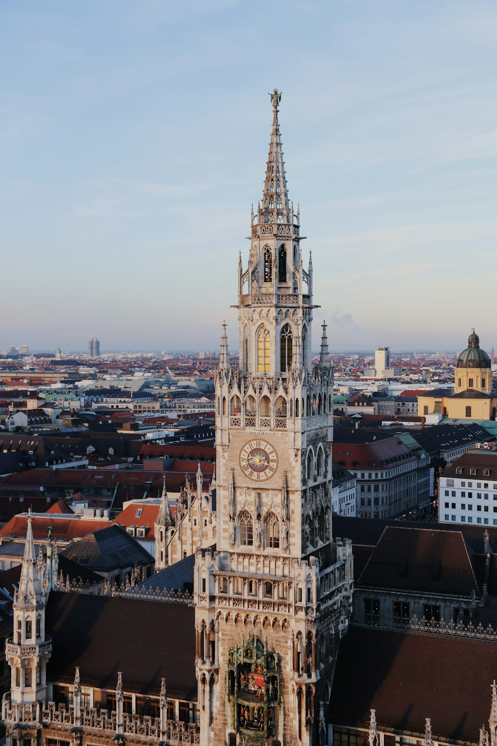 a large clock tower towering over a city