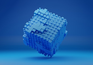 a blue cube shaped object on a blue background