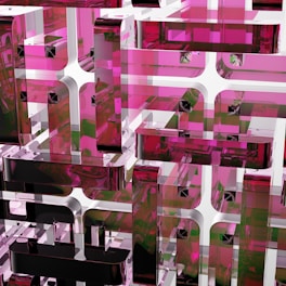 Interlocking geometric shapes featuring translucent pink and clear materials create a complex and layered pattern. The design is abstract, resembling modern architecture or digital art with reflective surfaces.