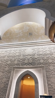 Artistic shot of the floral forest motifs decorating the walls and ceiling of the restaurant