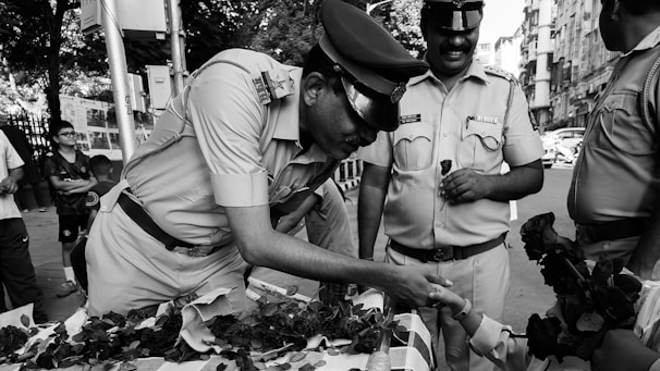 A dedicated field officer engaging respectfully with a client during a recovery visit.