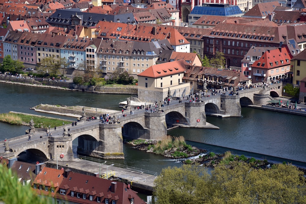 a bridge over a river in a city