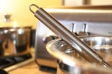 Close-up of a sleek, modern kitchen gadget with stainless steel finish.