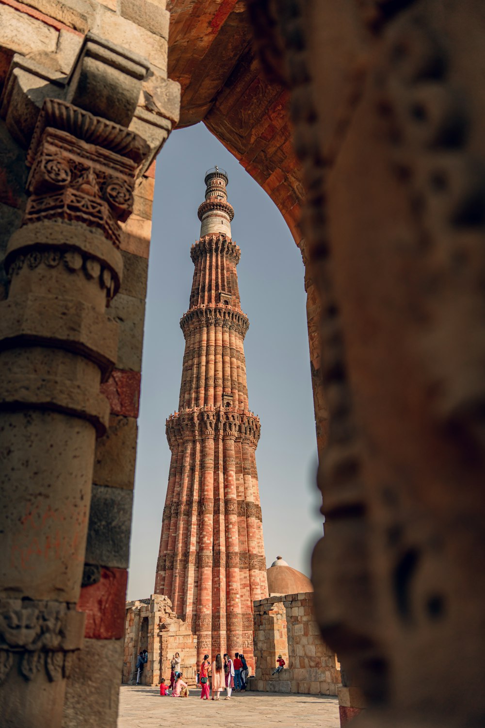 a tall tower with a clock on top of it