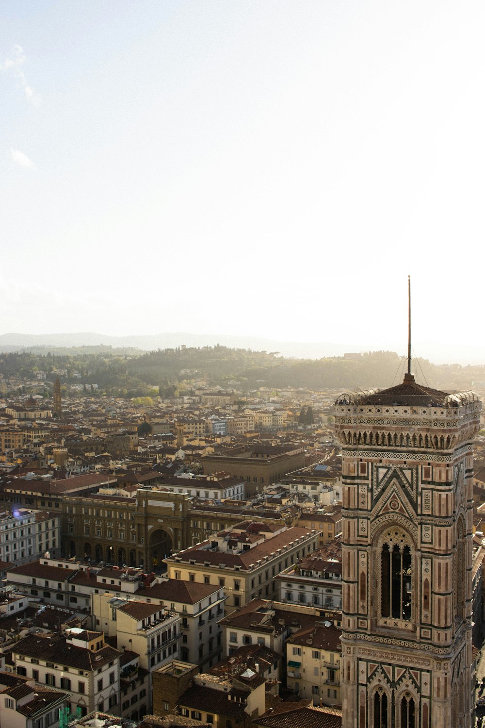 a tall tower with a clock on top of it