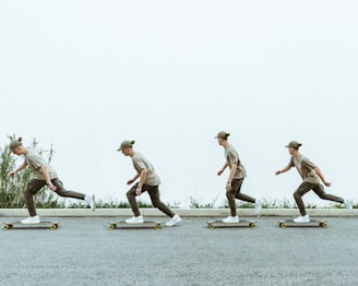 a man riding a longboard skateboard down a street
