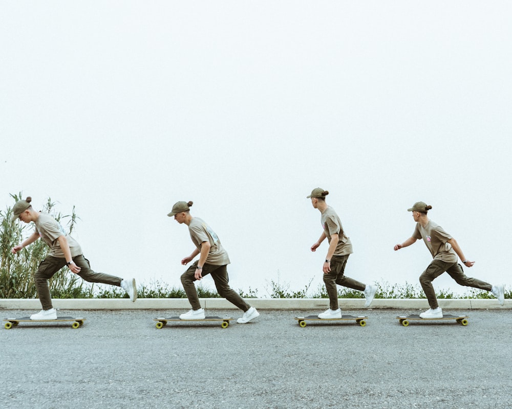 a man riding a skateboard down a street