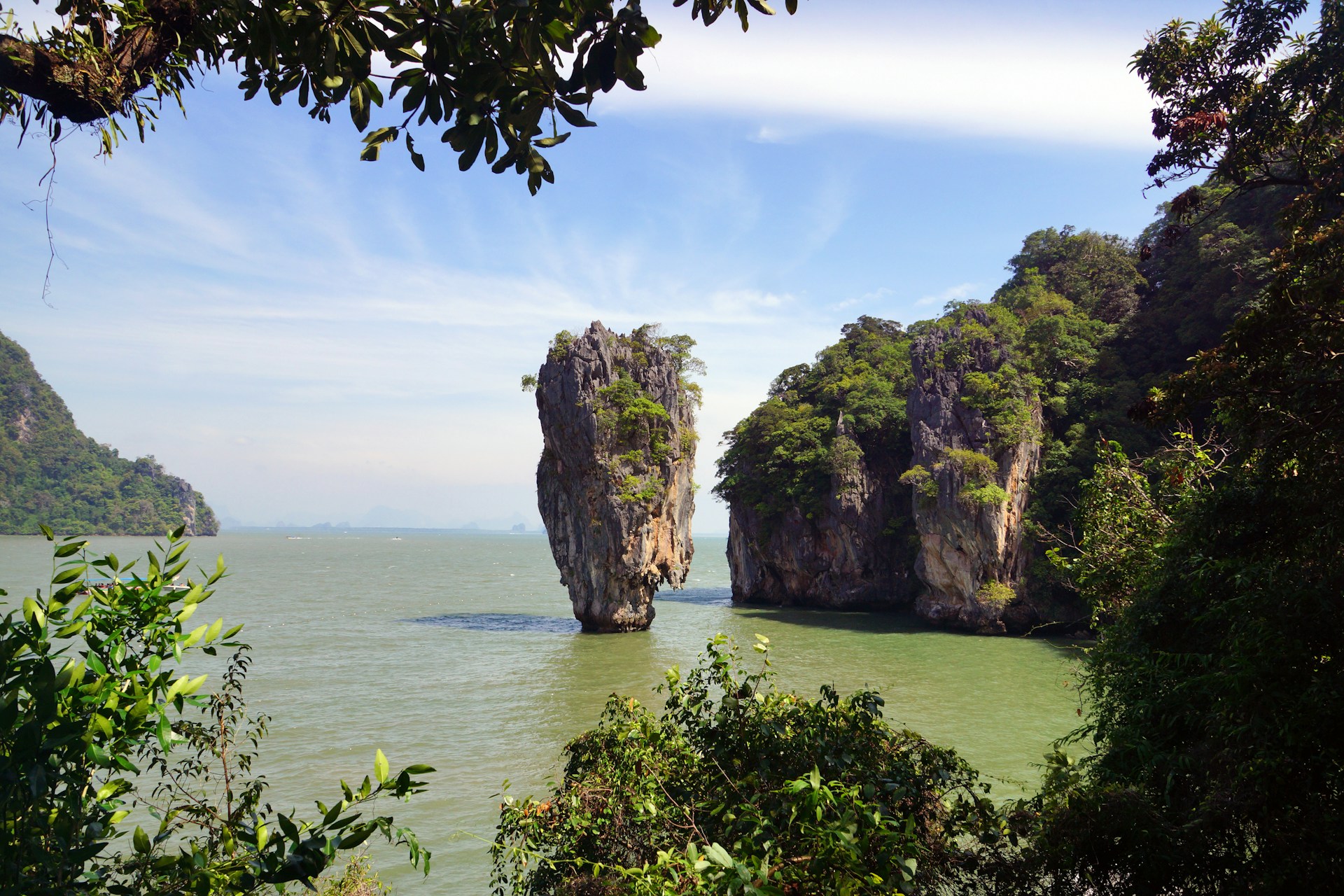 A body of water surrounded by trees and rocks