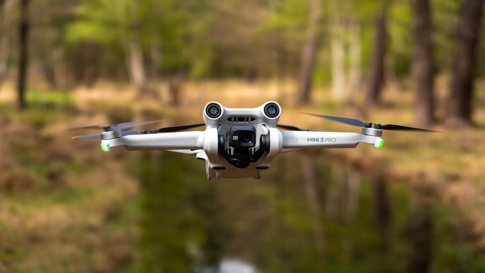 a white and black remote controlled flying device