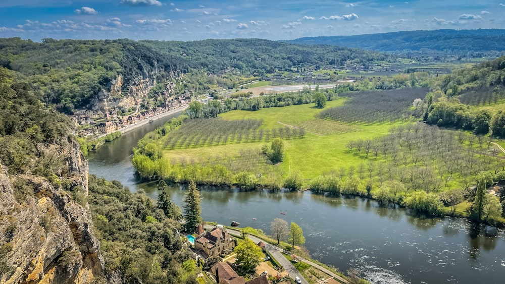 a river running through a lush green valley