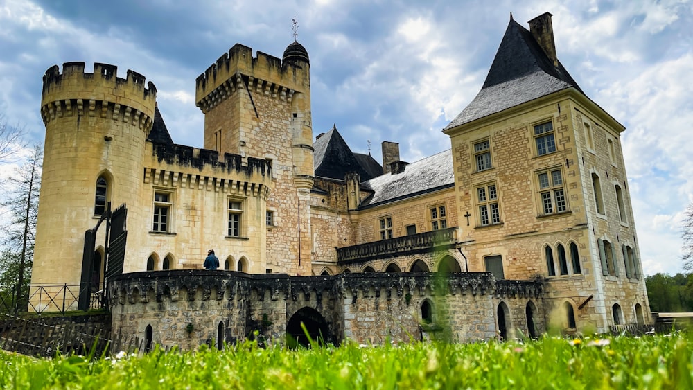 a large castle with a clock tower on top of it