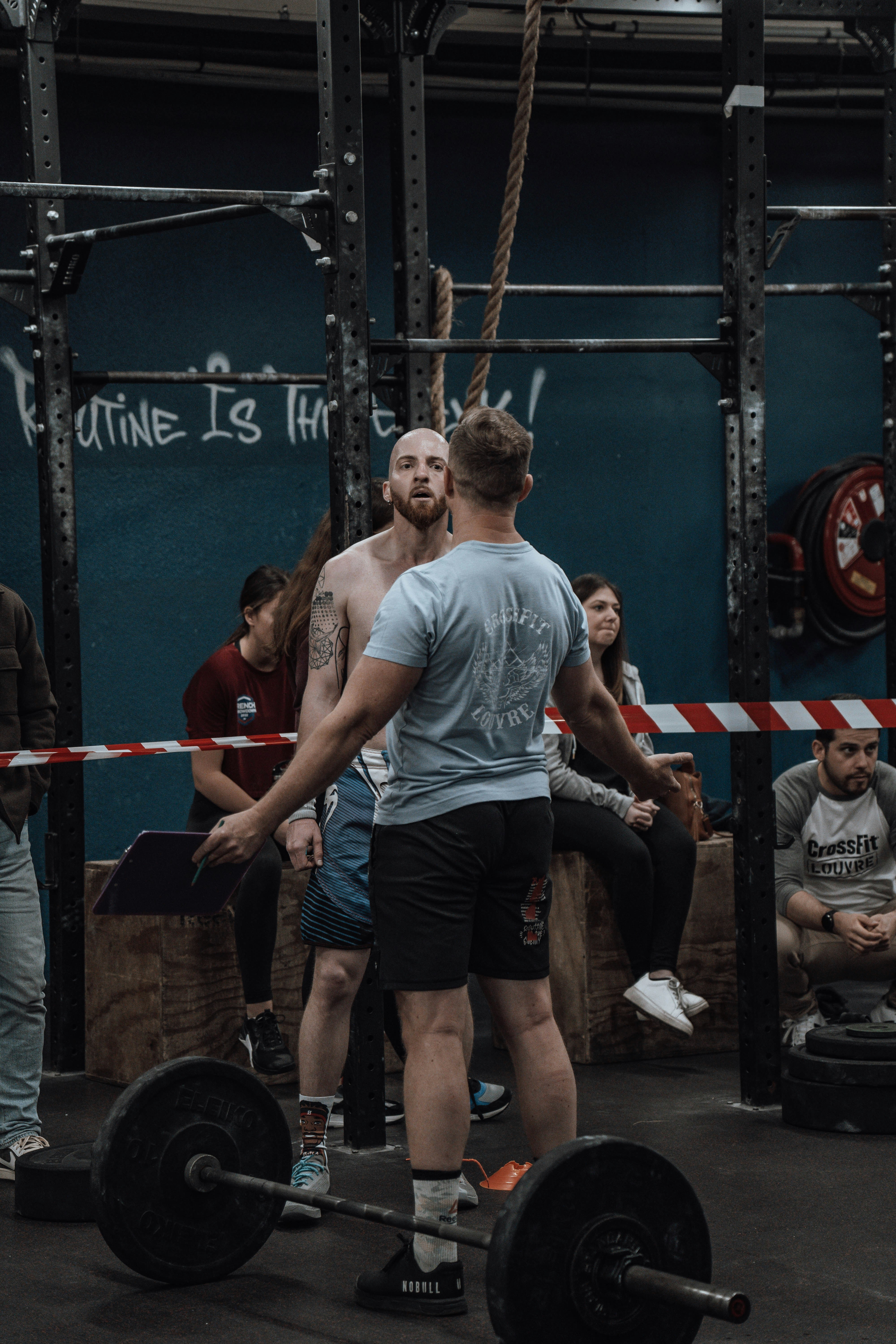 a group of men working out in a gym