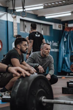 a group of men working out in a gym