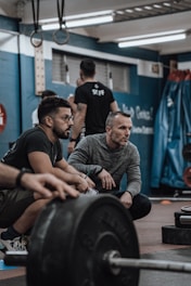 a group of men working out in a gym