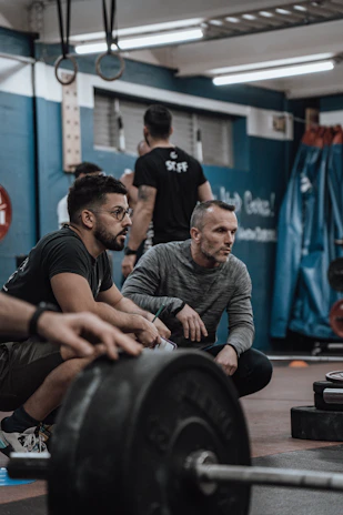 a group of men working out in a gym