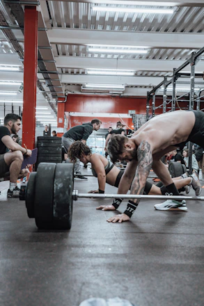 a group of men working out in a gym
