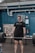 A fit athlete lifting weights in a gym, showcasing strength and determination.