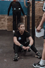 A close-up of a coach giving personalized advice during a workout