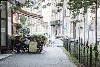 A cozy café with outdoor seating in a quaint town.