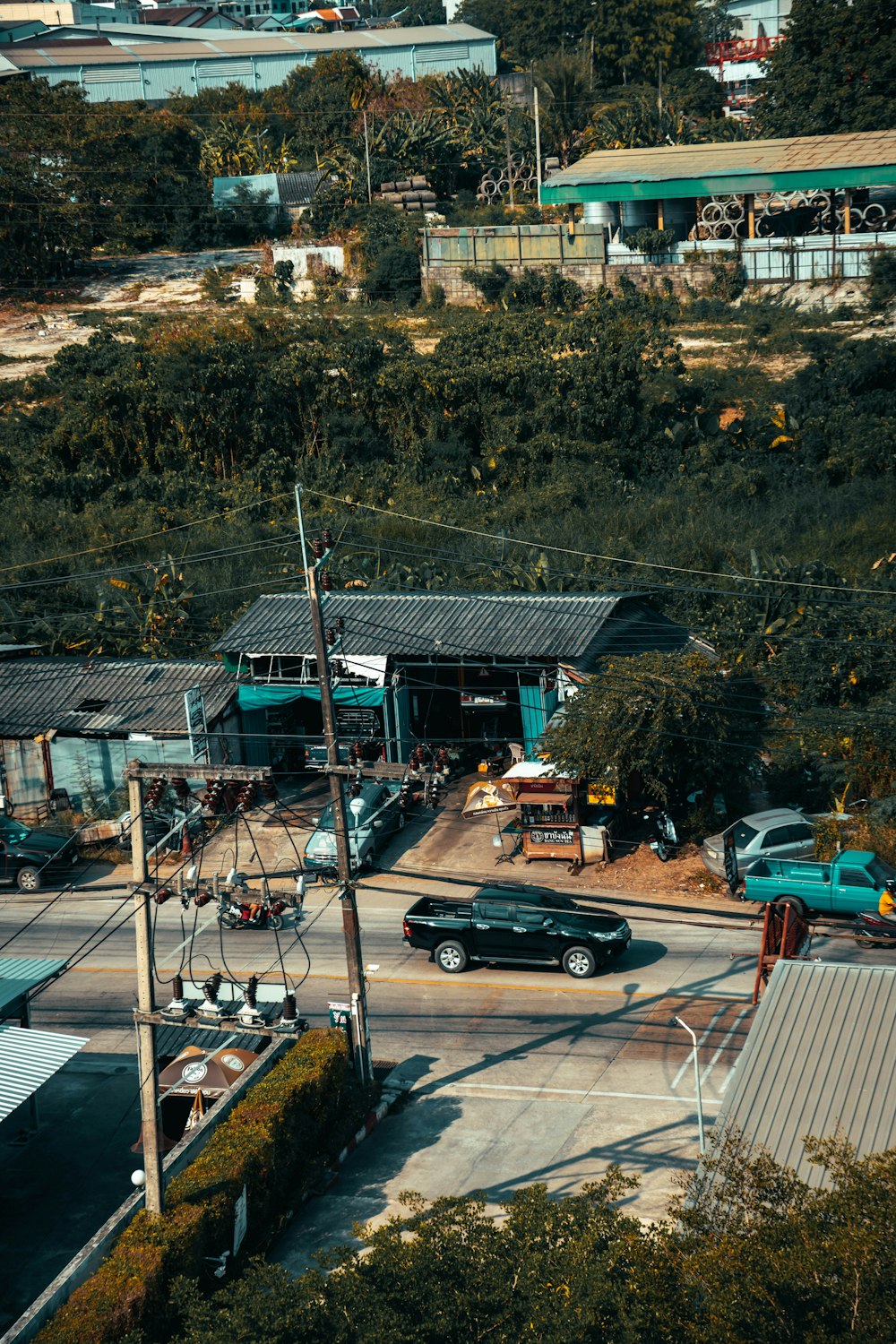 a parking lot with cars parked in front of it