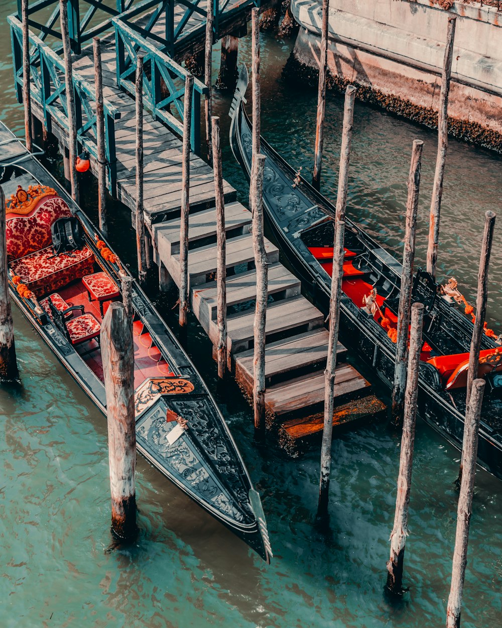 a couple of boats that are sitting in the water