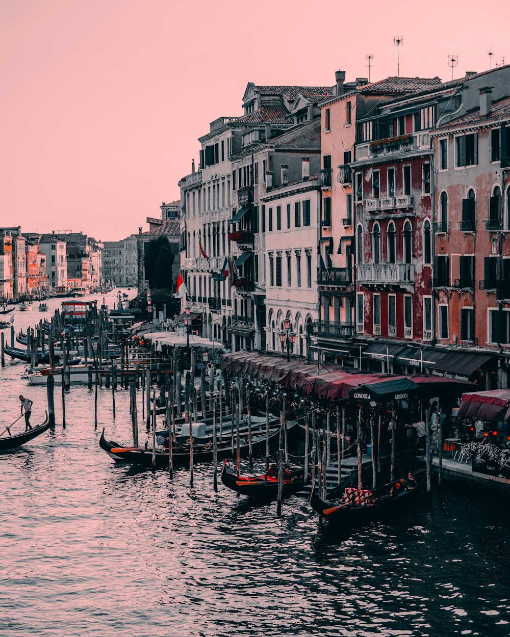 a body of water filled with lots of buildings