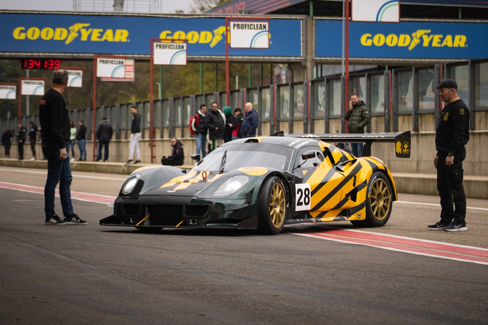 a race car is parked on a race track