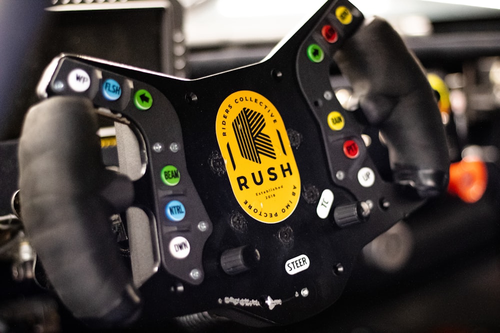 a close up of a steering wheel on a race car