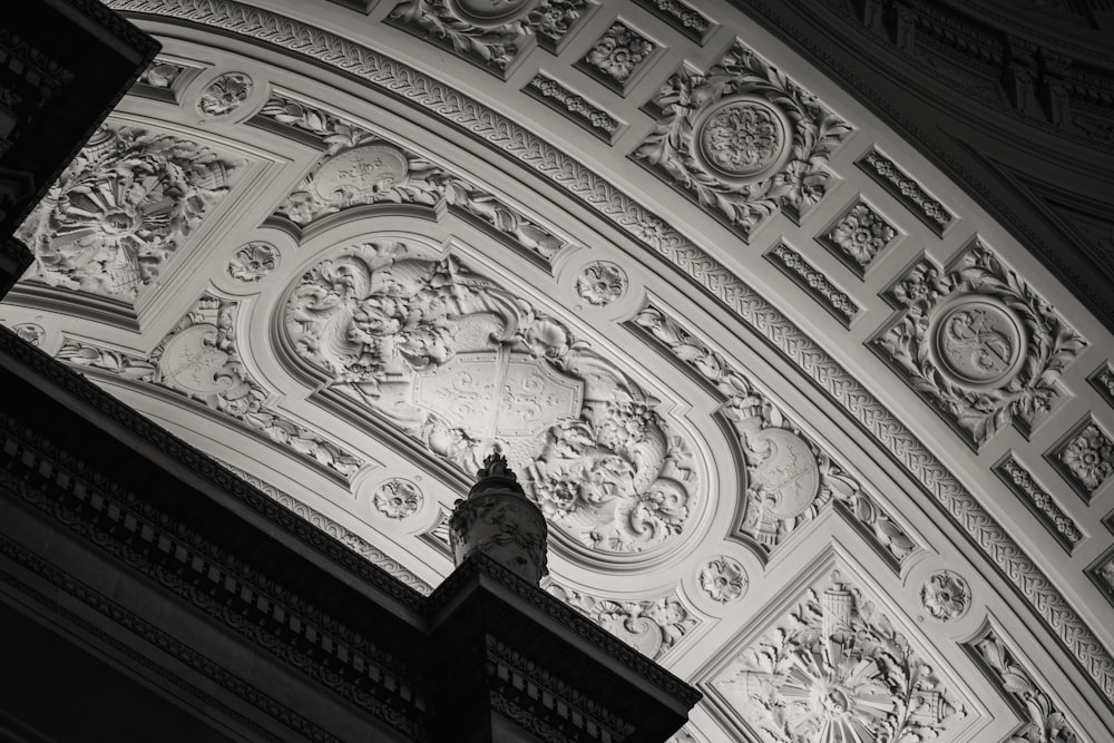 a black and white photo of a clock tower