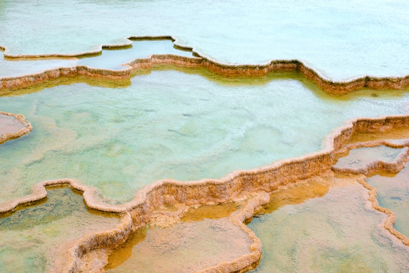 Natural thermal pools with mineral-rich turquoise water