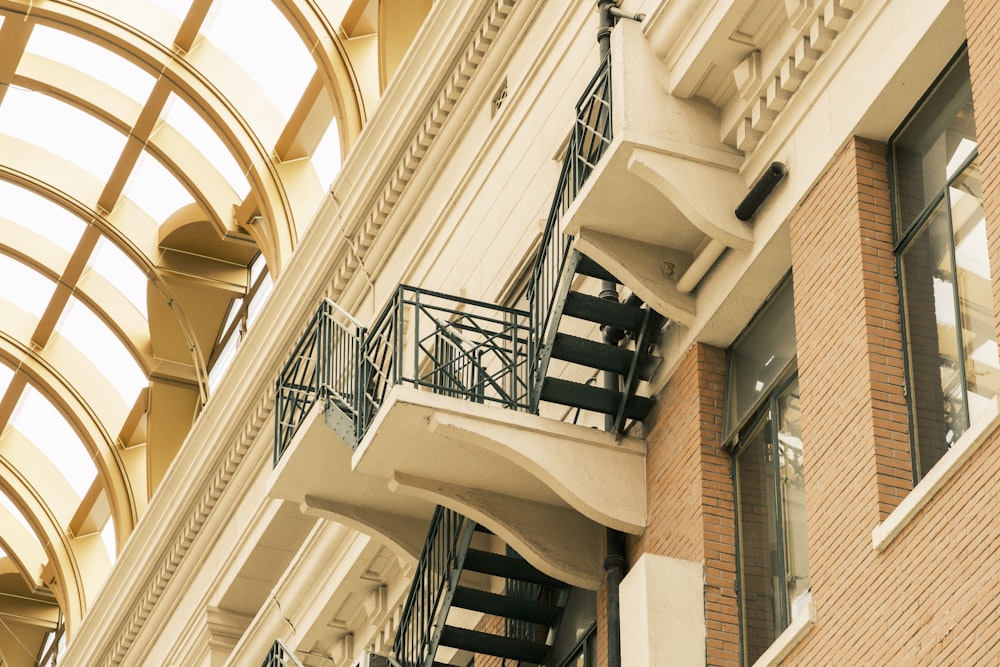 a building with a bunch of balconies on the side of it