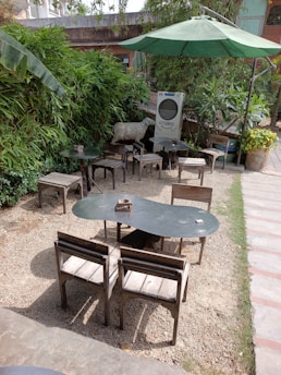 Modern air conditioning units installed in a cozy outdoor seating area