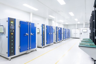 a row of blue and white lockers in a room