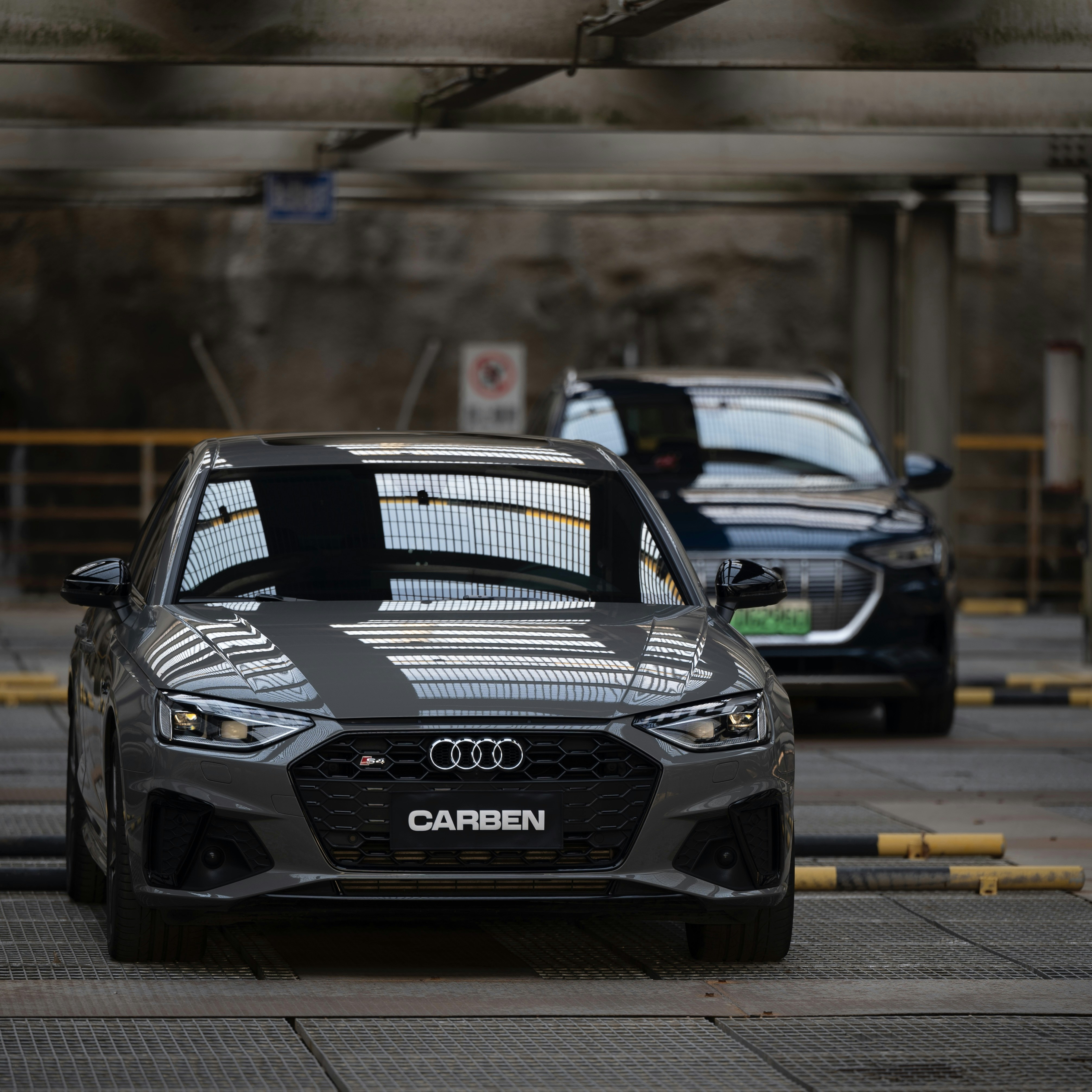 a couple of cars parked next to each other