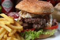 a hamburger and french fries on a plate