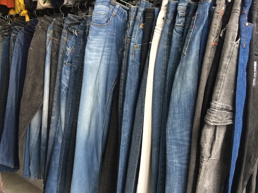 A vibrant display of women's jeans showcasing various styles and colors.
